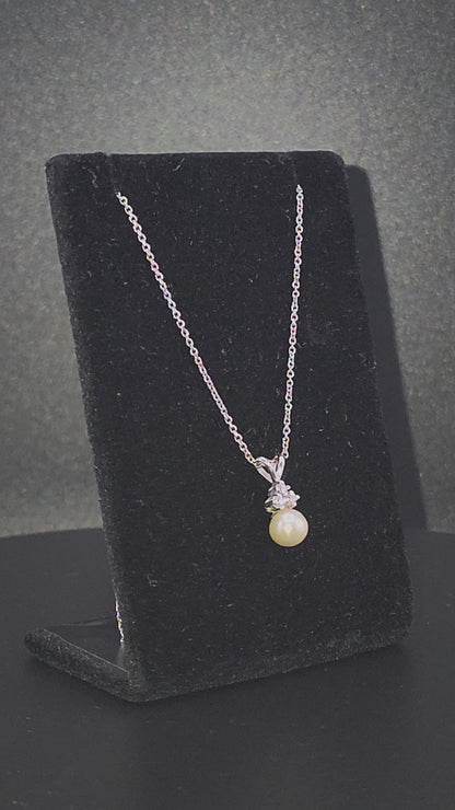 Elegant Pearl Drop Pendant with Diamonds